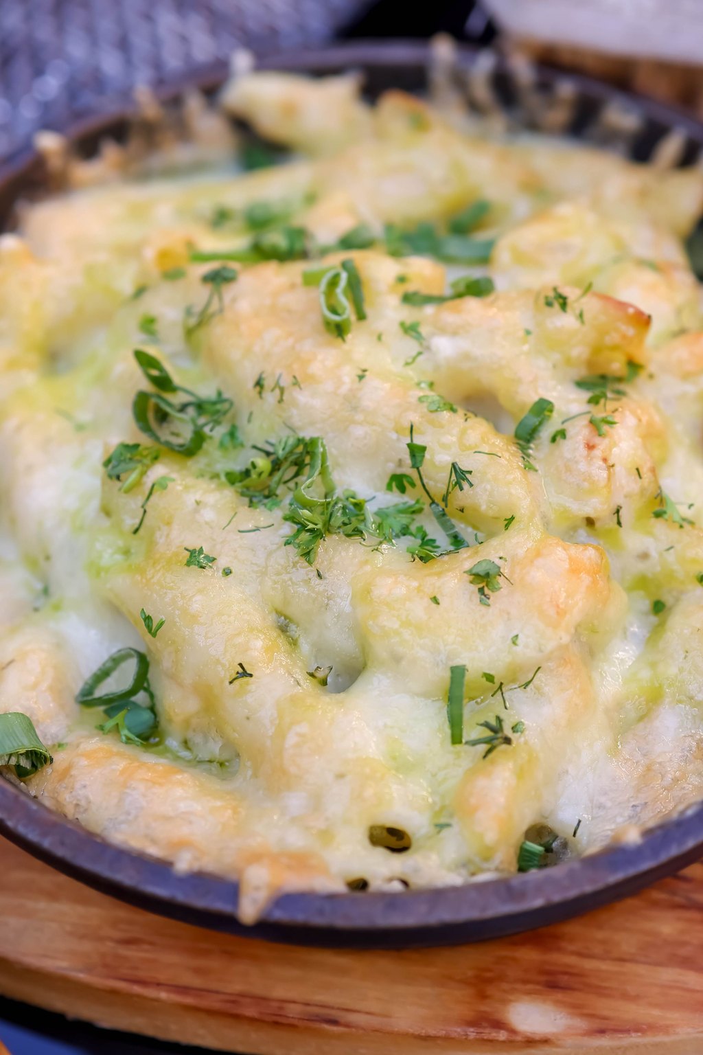 Close up of creamy baked macaroni and cheese