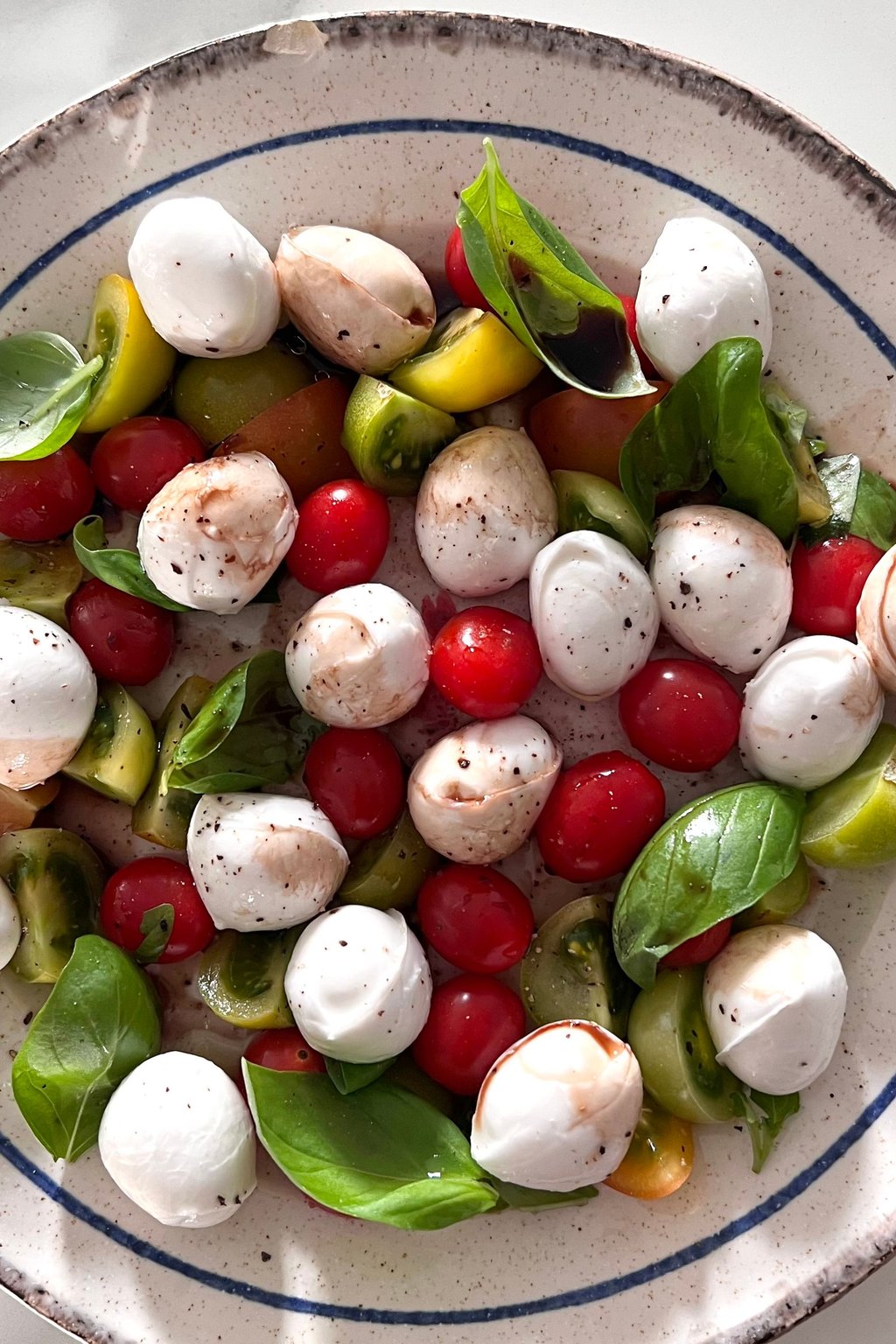 Close up of caprese skewers with balsamic glaze