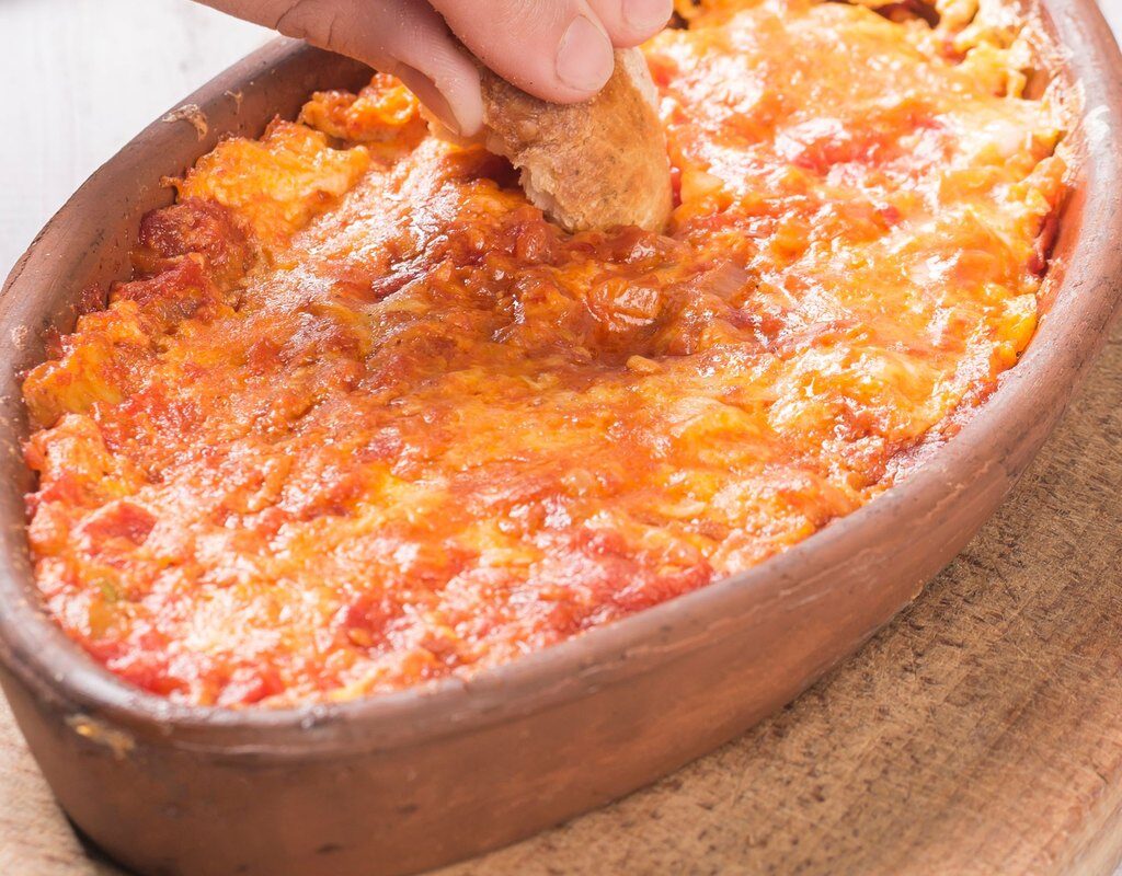 Close up of hot spinach artichoke dip