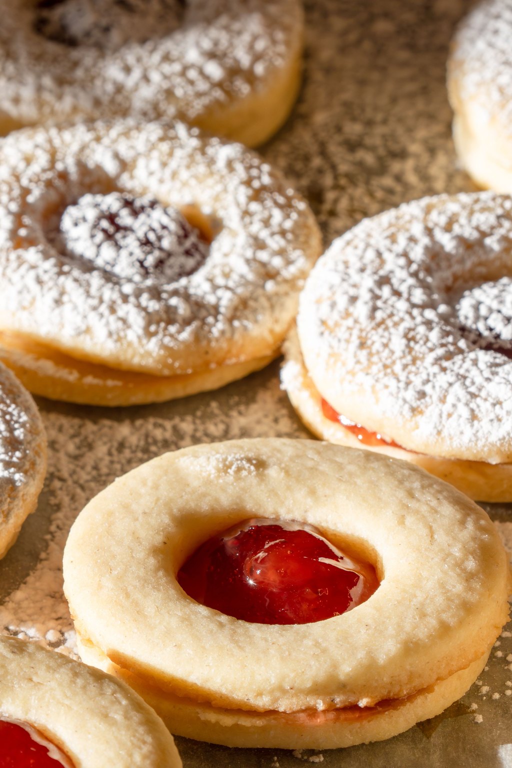 Close up of raspberry linzer cookies