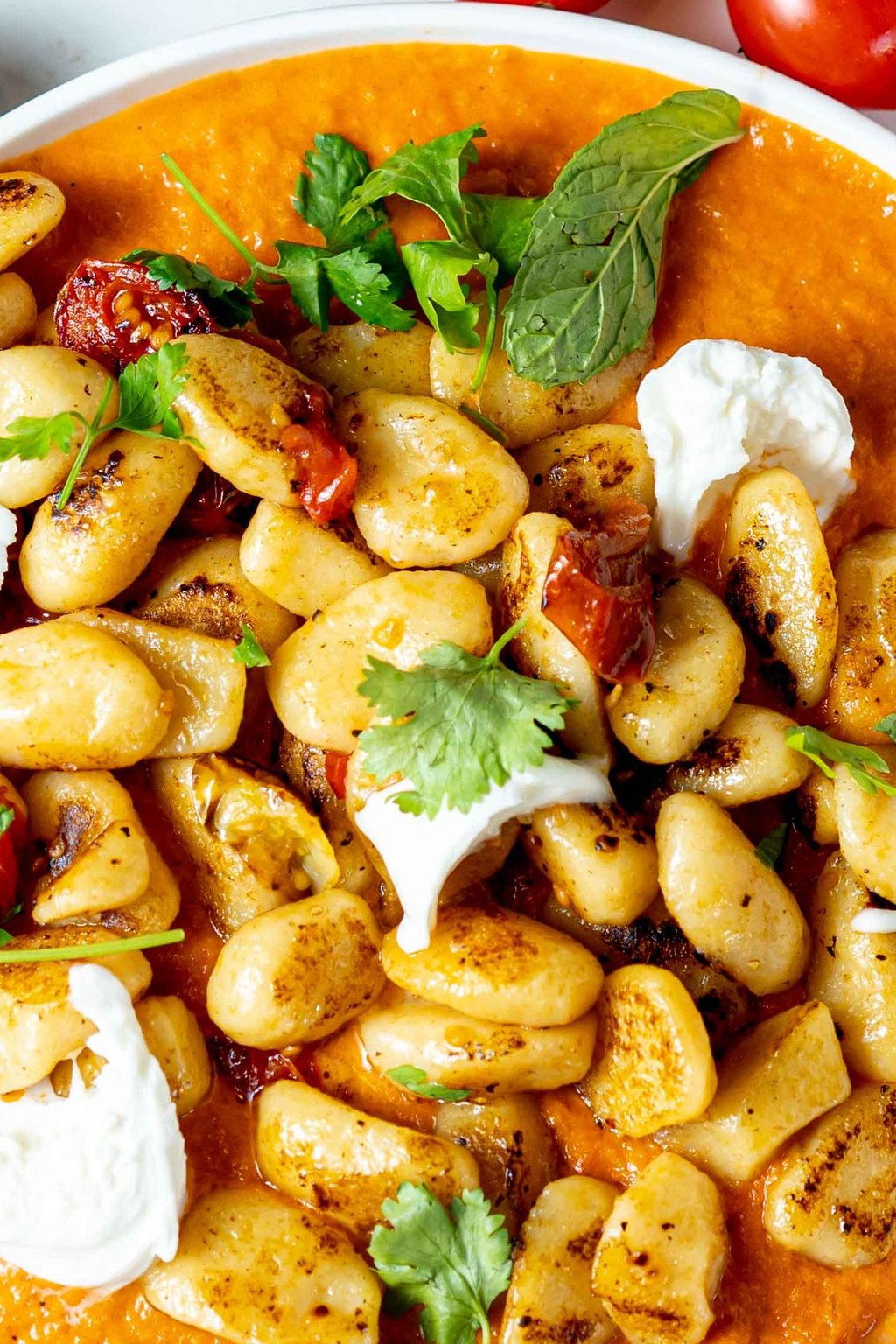 Close up of sheet pan gnocchi with butternut squash and sage
