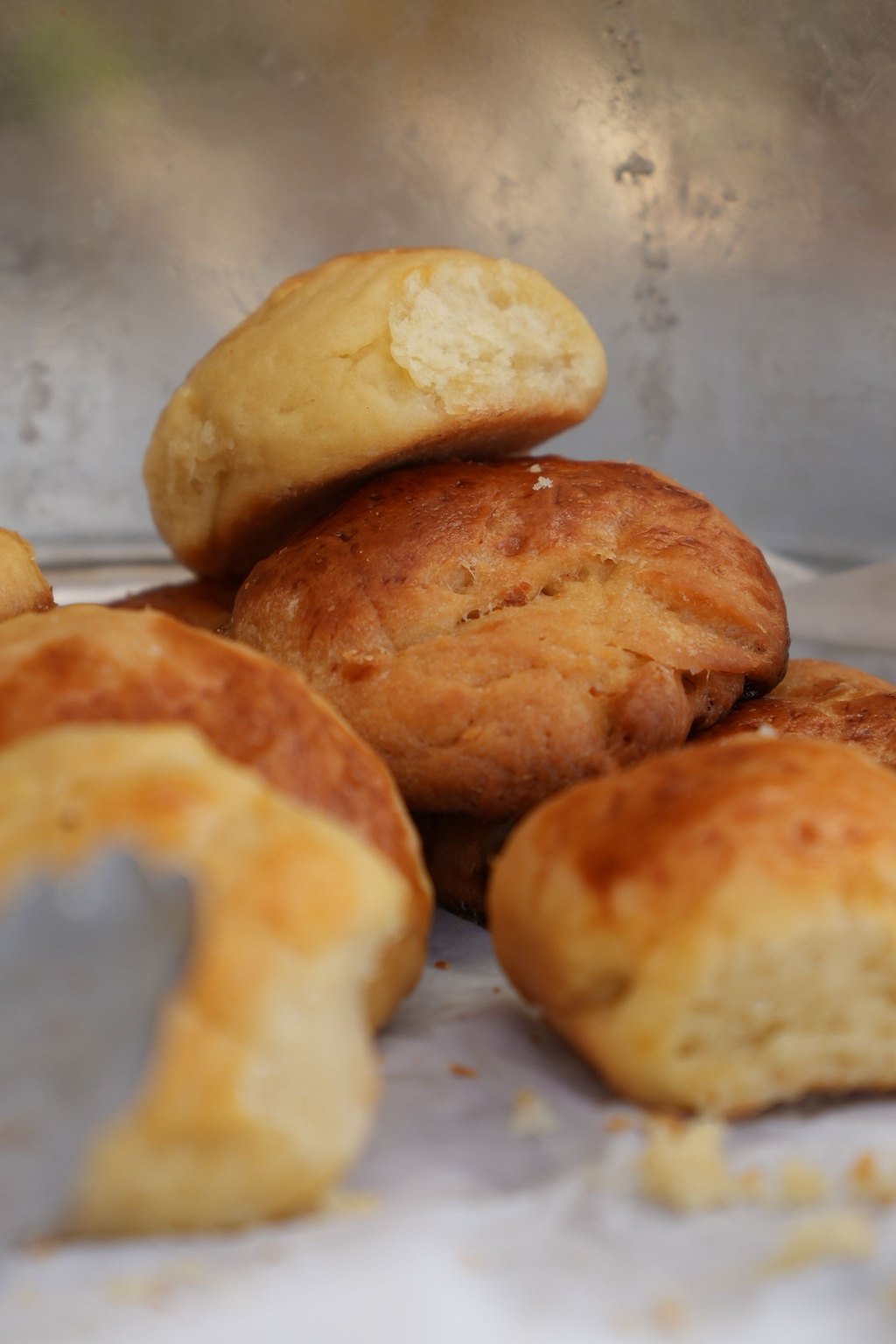 Close up of buttermilk biscuits and sausage gravy
