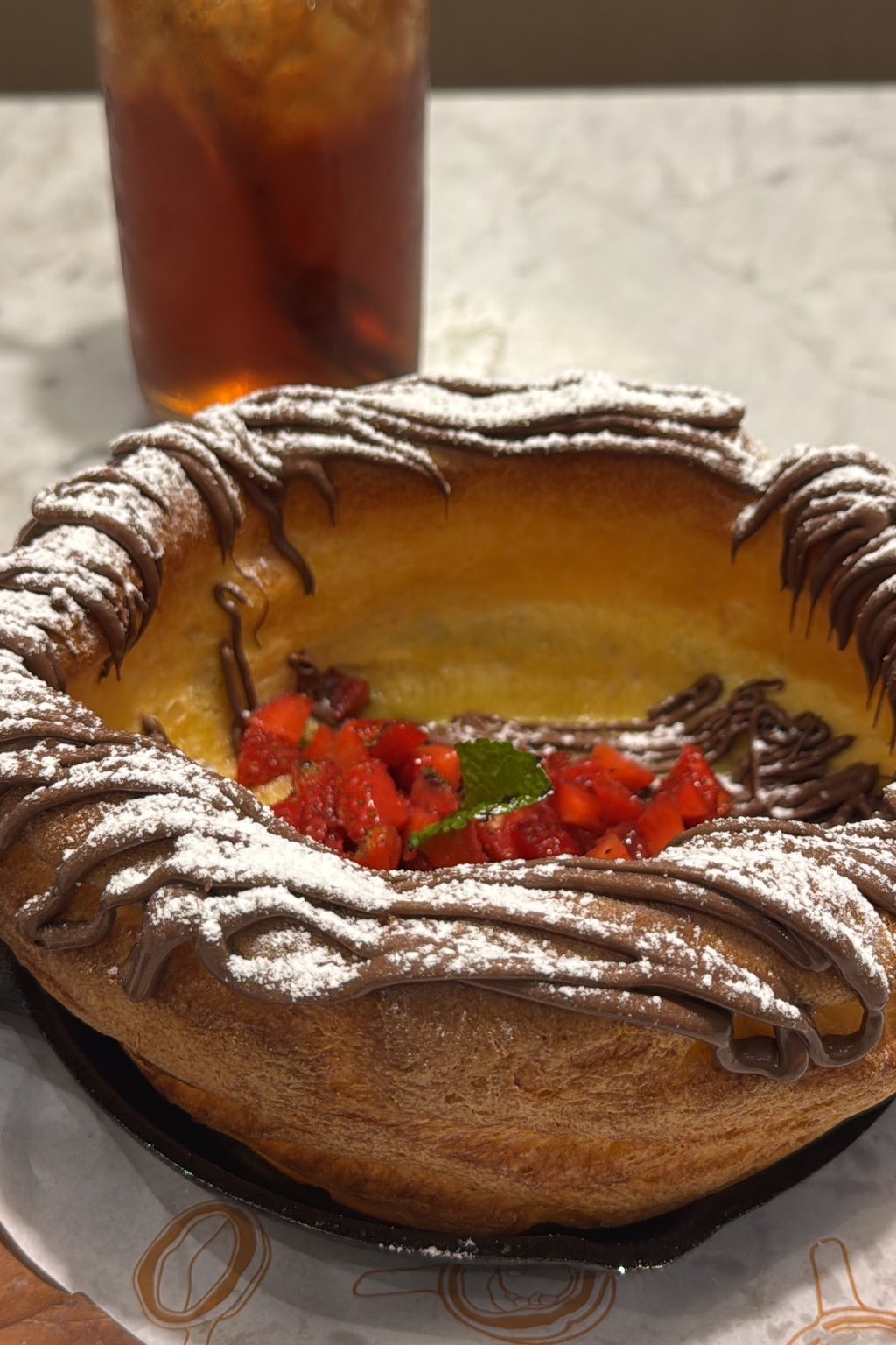 Close up of puffy dutch baby pancake