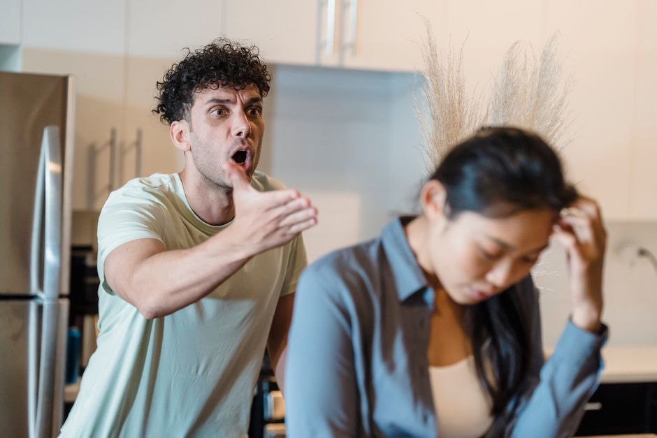 A couple in visible conflict, with one partner yelling while the other looks distressed, reflecting the tension of a relationship that may be falling apart.