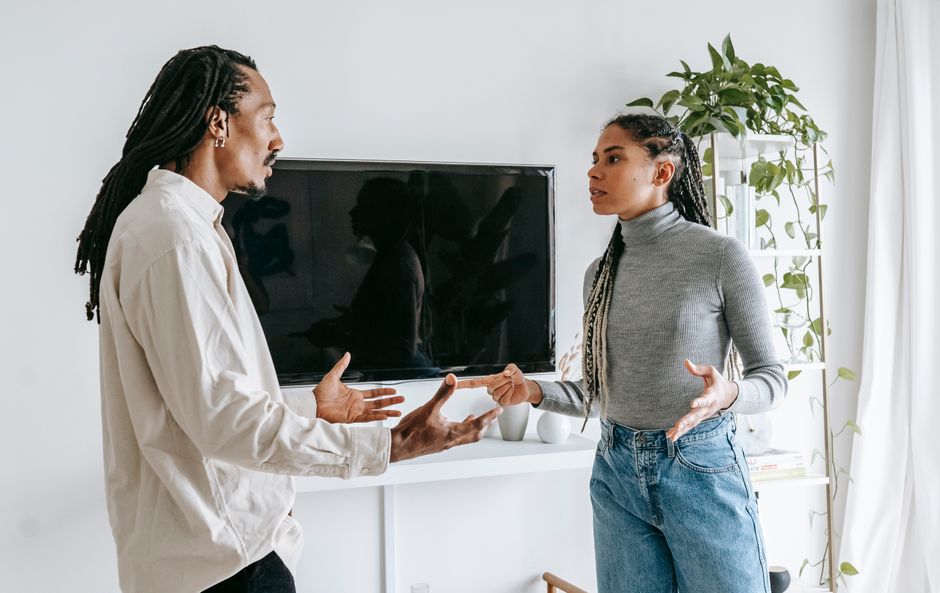 A couple having an open, direct conversation instead of relying on hints.