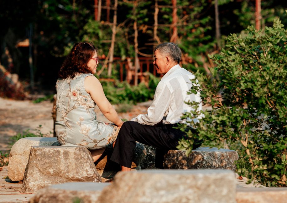 An older couple shares an intimate conversation outdoors, reflecting the loyalty and respect that keeps marriages strong for decades.