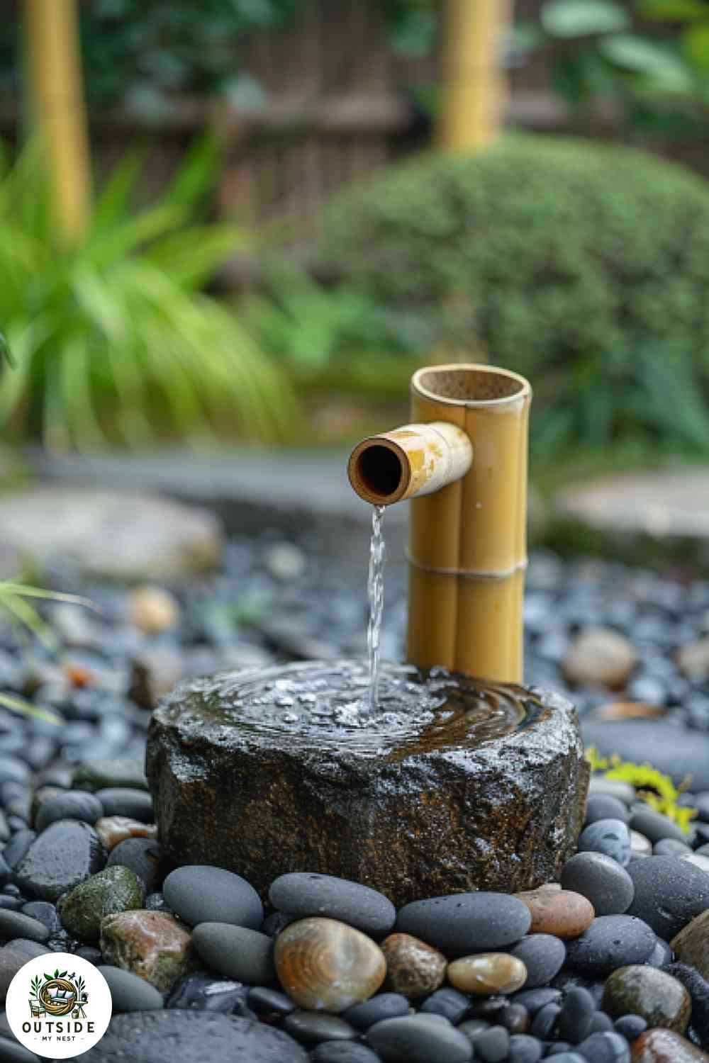 Minimalist bamboo fountain in a Zen garden