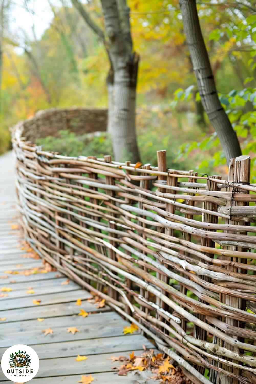 Woven willow fence around a deck for privacy