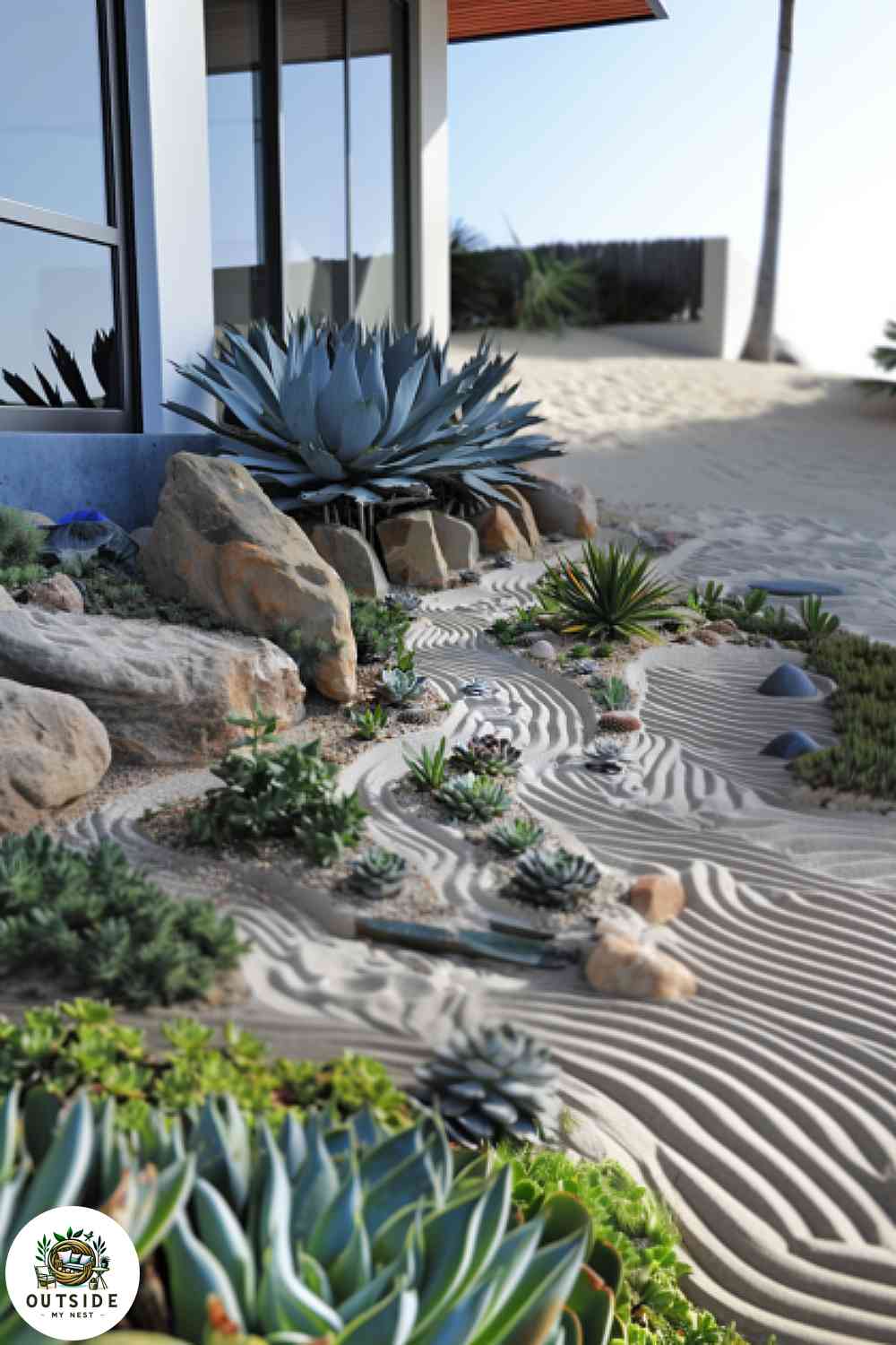 Zen garden with succulents and sand patterns